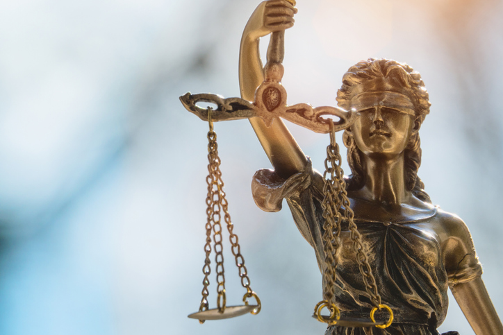 Lady Justice or Justicia in front of blurred background - The Law Offices of Jane M. Randall, P.A. - Family Law, Family Mediation, Real Estate Attorney | in York County, Chester County, Lancaster County